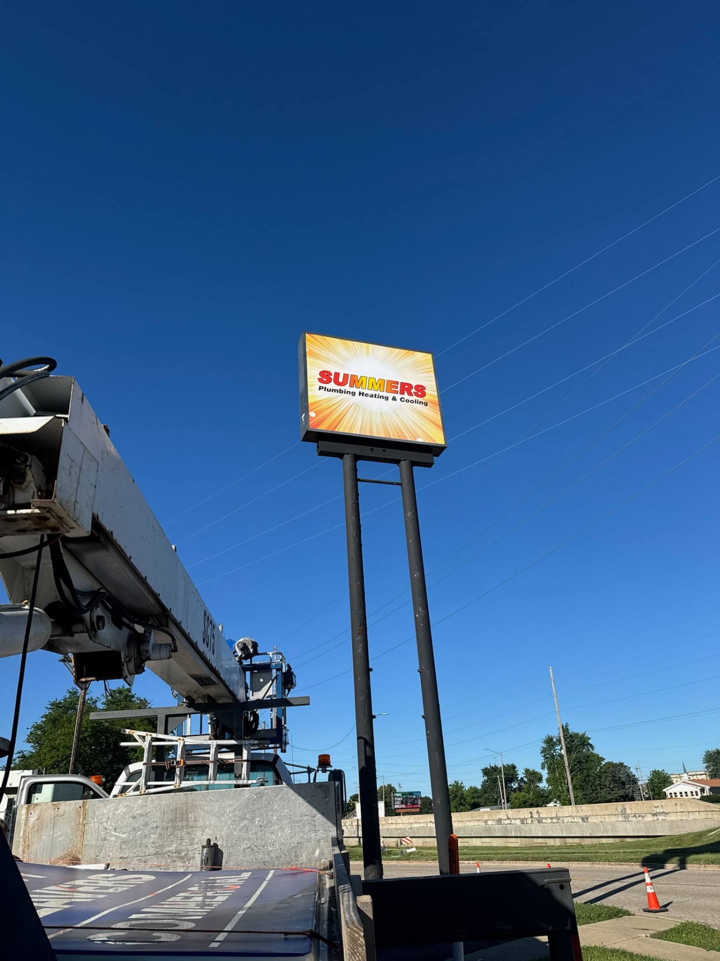 Summers Plumbing Heating & Cooling high-rise pylon cabinet sign