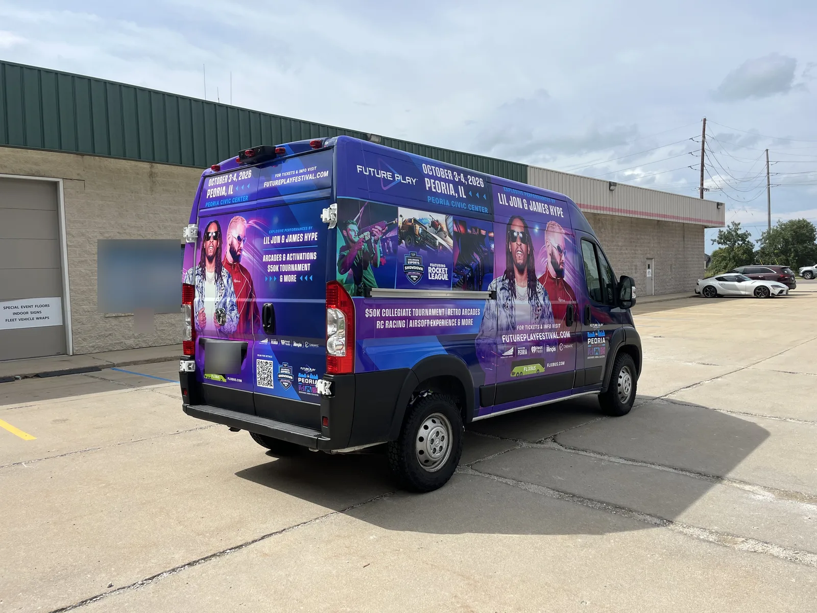Rear and side view of a wrapped Ram ProMaster van for the Future Play Festival