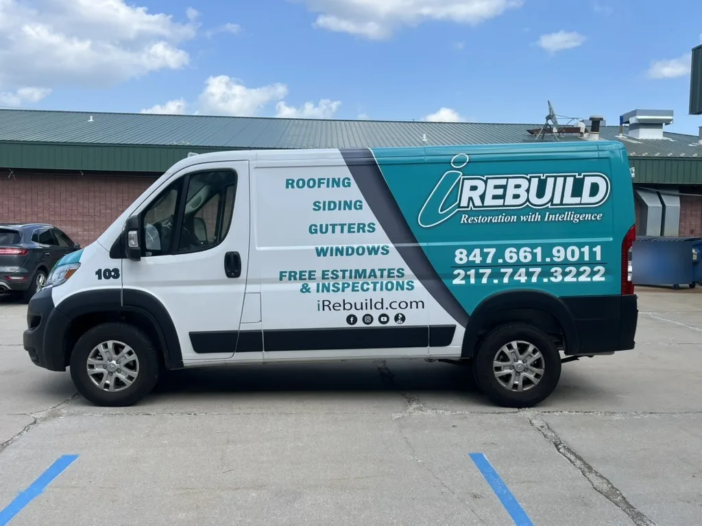 Teal, gray, and white wrap on a work van for iRebuild