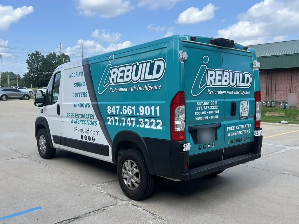 Back and side of the iRebuild van wrap with phone numbers and website