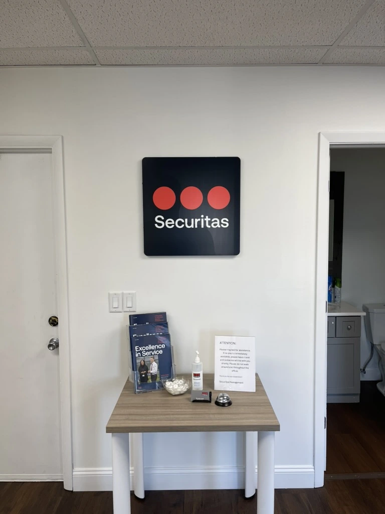 Securitas Office: Front desk sign