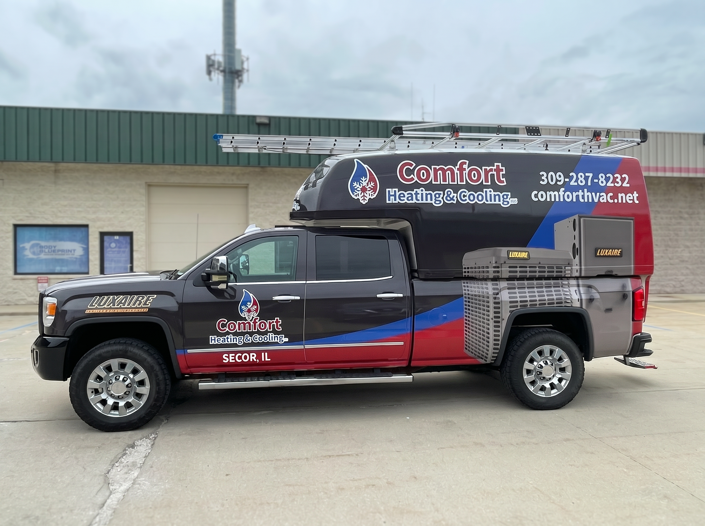 Comfort Heating & Cooling fleet service van wrap installed in Bloomington, IL