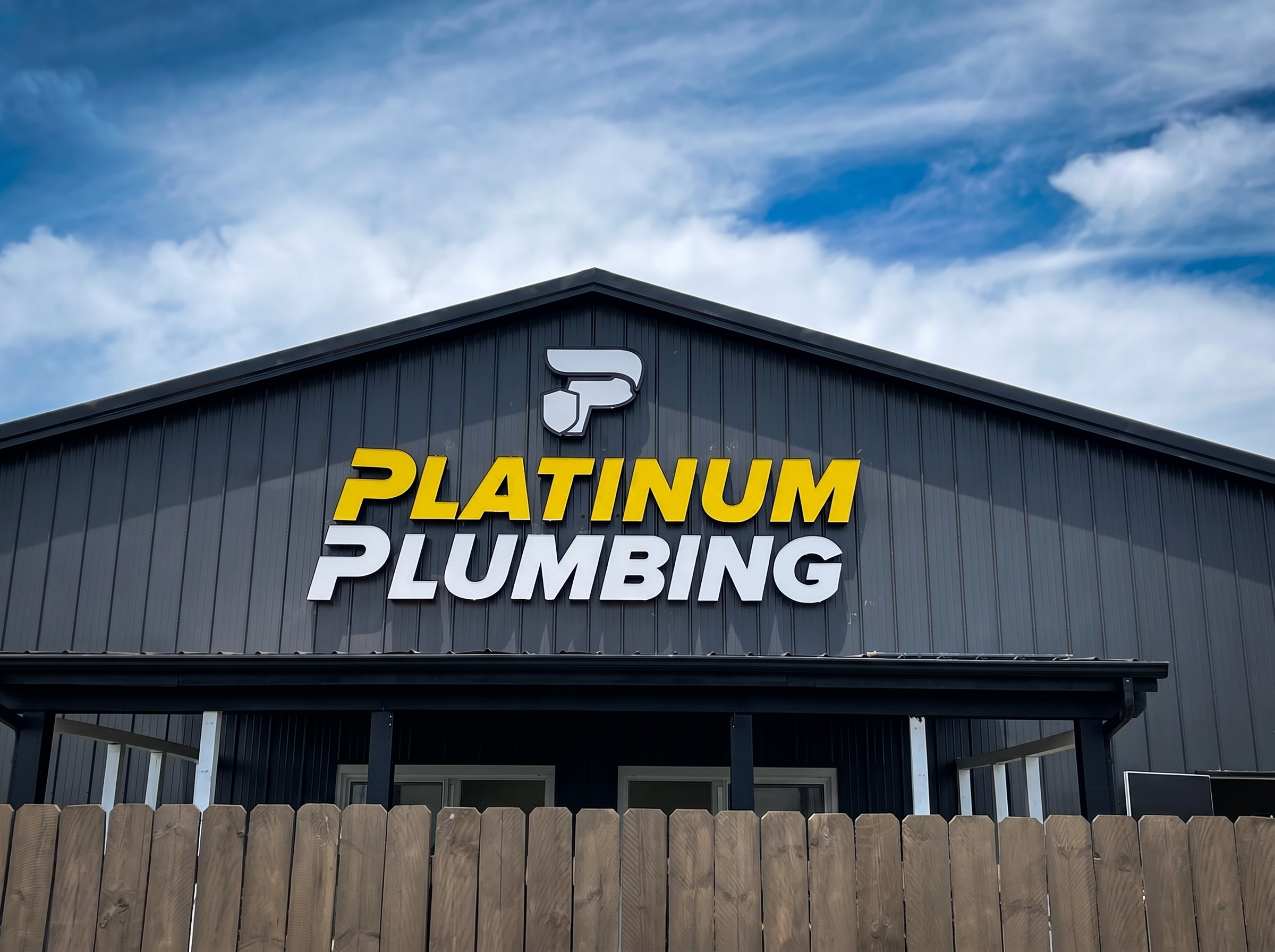 Platinum Plumbing post-and-panel exterior sign