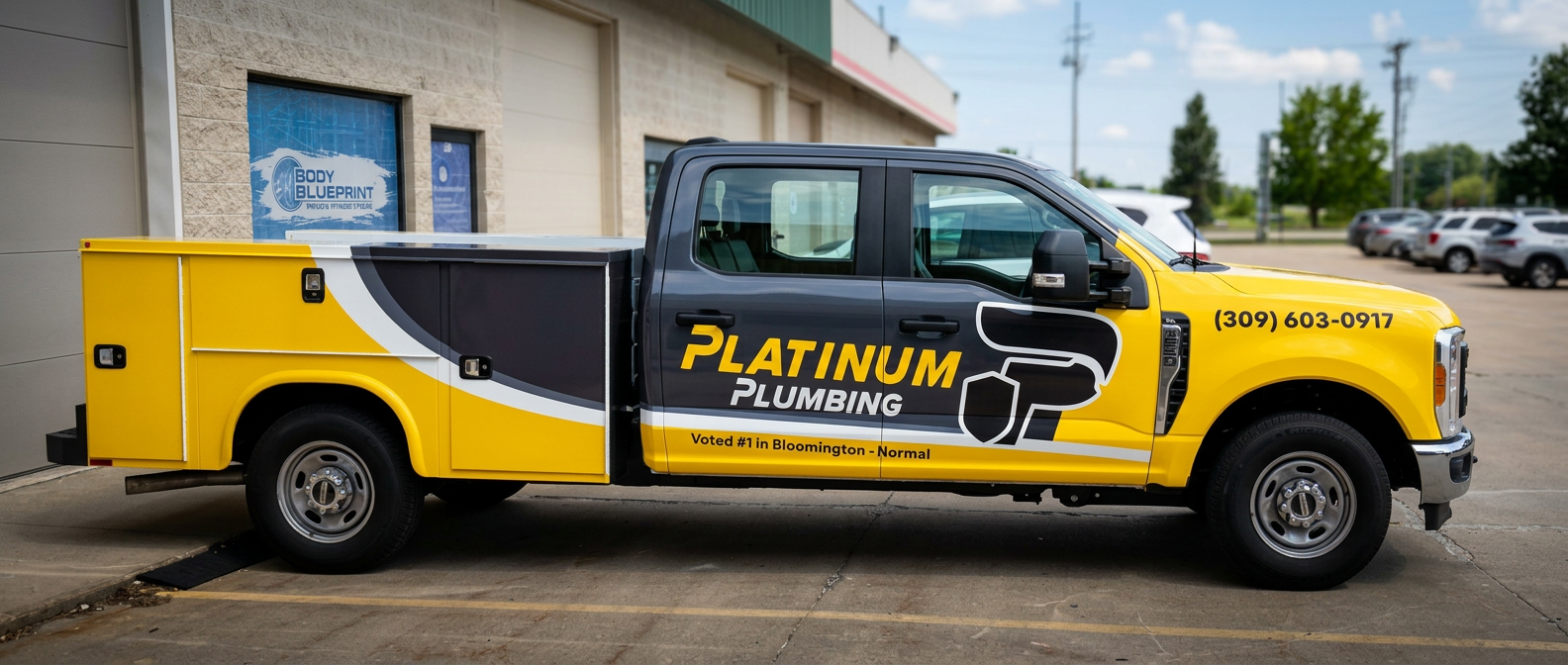Platinum Plumbing pickup truck fleet wrap matching the company van standard